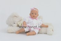 Csecsemő baba, rózsaszín ruhában